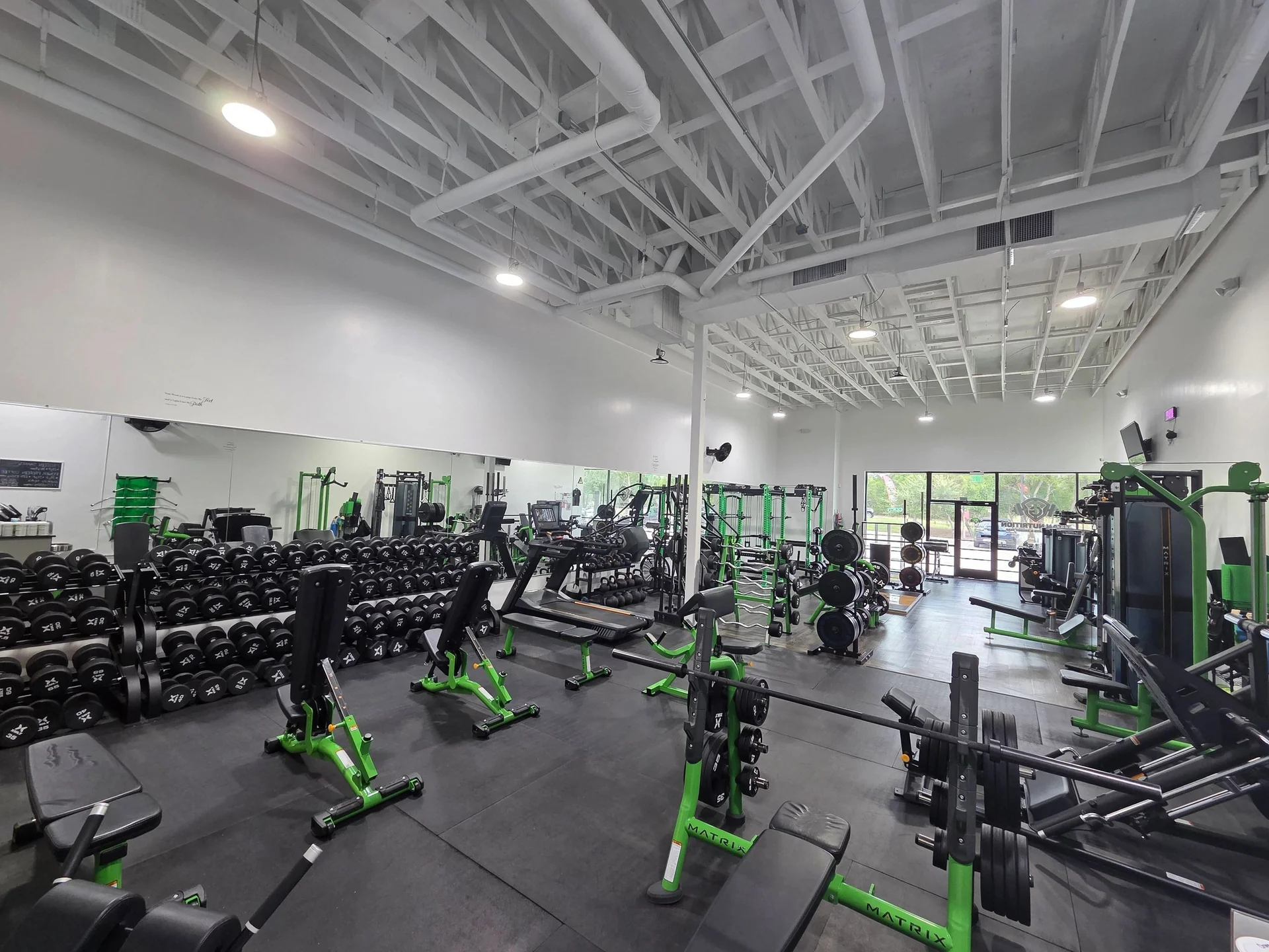 Wide view of Titan Gym's training floor in Alamo Ranch